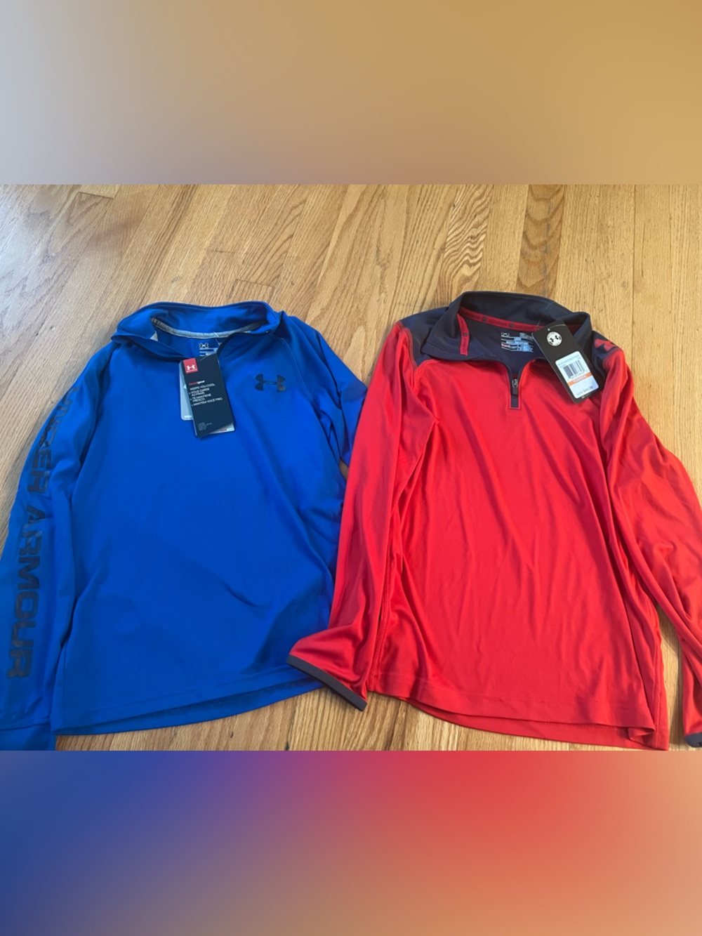 2 Under Armour Long-Sleeve Performance Shirts